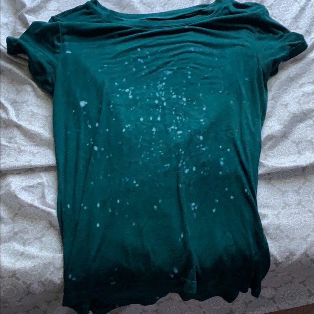 green and light blue shirt